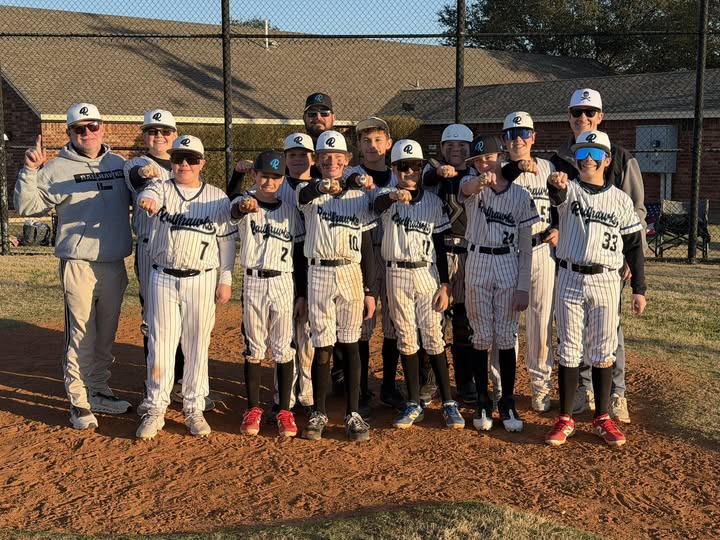 Texas Railhawks 10U travel baseball team with coaches at Train Station Baseball Academy in Argyle TX